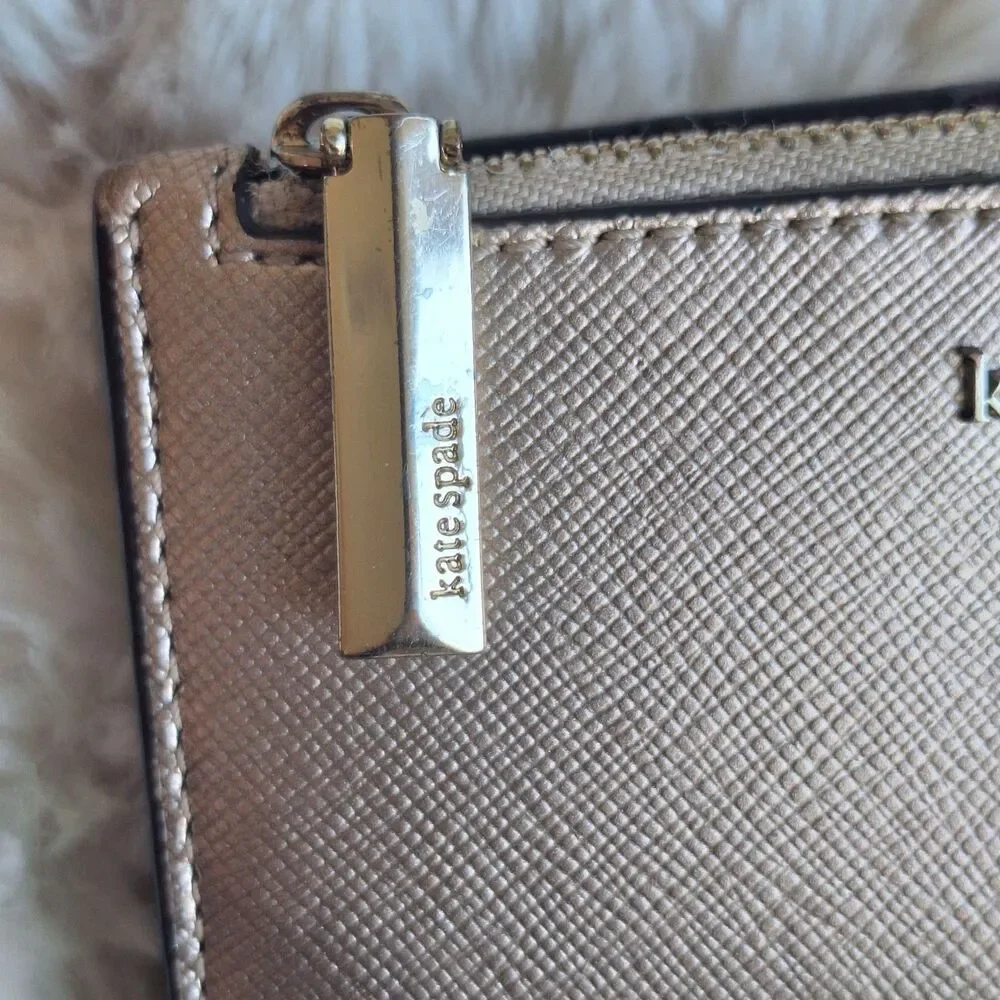 Kate Spade New York Spencer Metallic Slim Bifold Wallet Rose Gold Small Pink